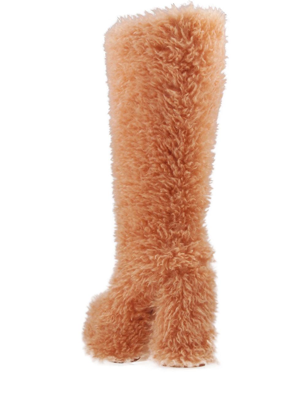 Tan-colored slip-on knee high boots with shearling top and block heels for women--posterior view