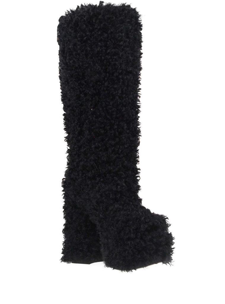 Women's black-colored slip-on knee high boots with shearling top and block heels-corner view