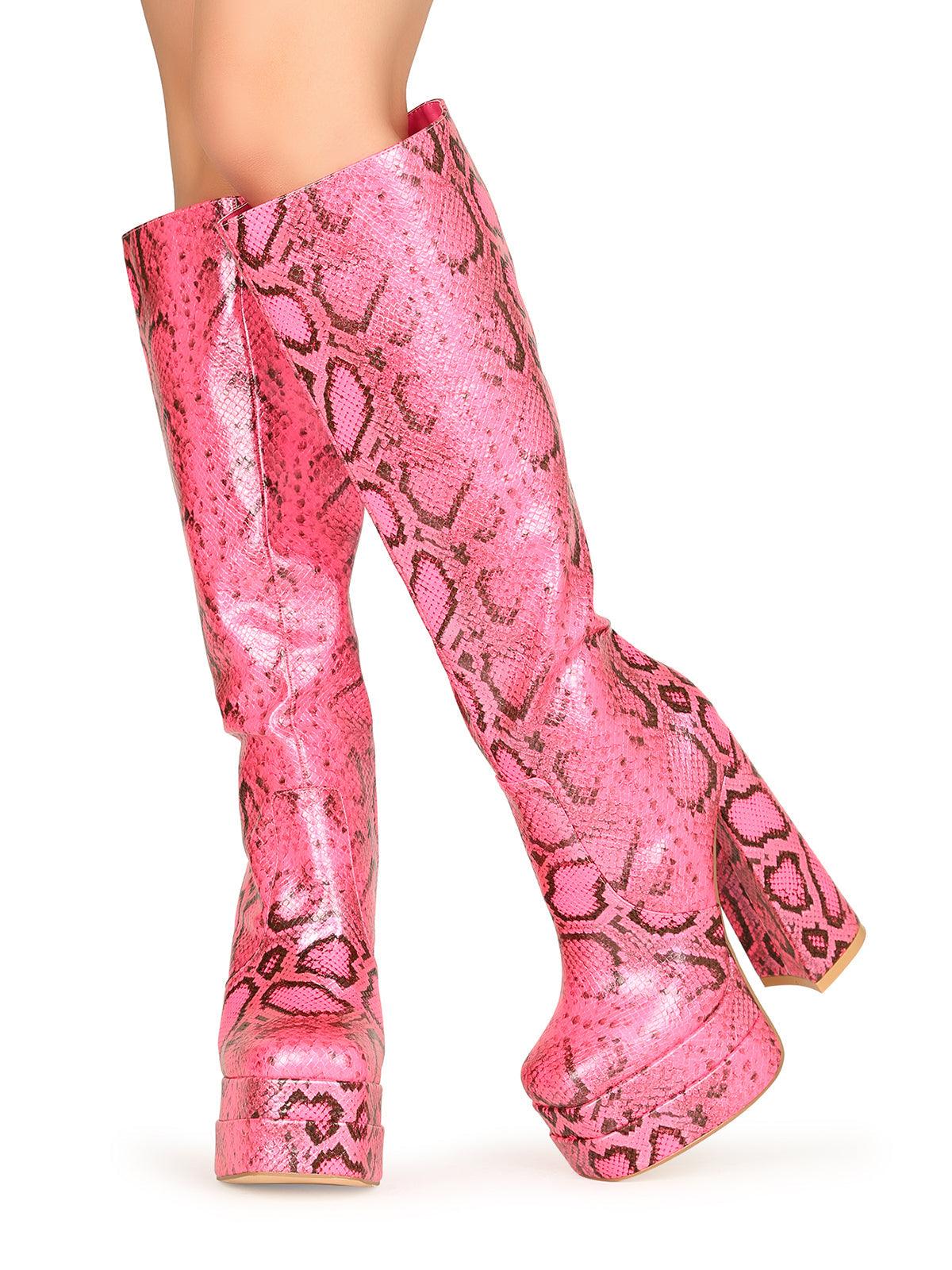 Women's fuchsia-colored knee-high block heel boots with snake design and side zipper closure