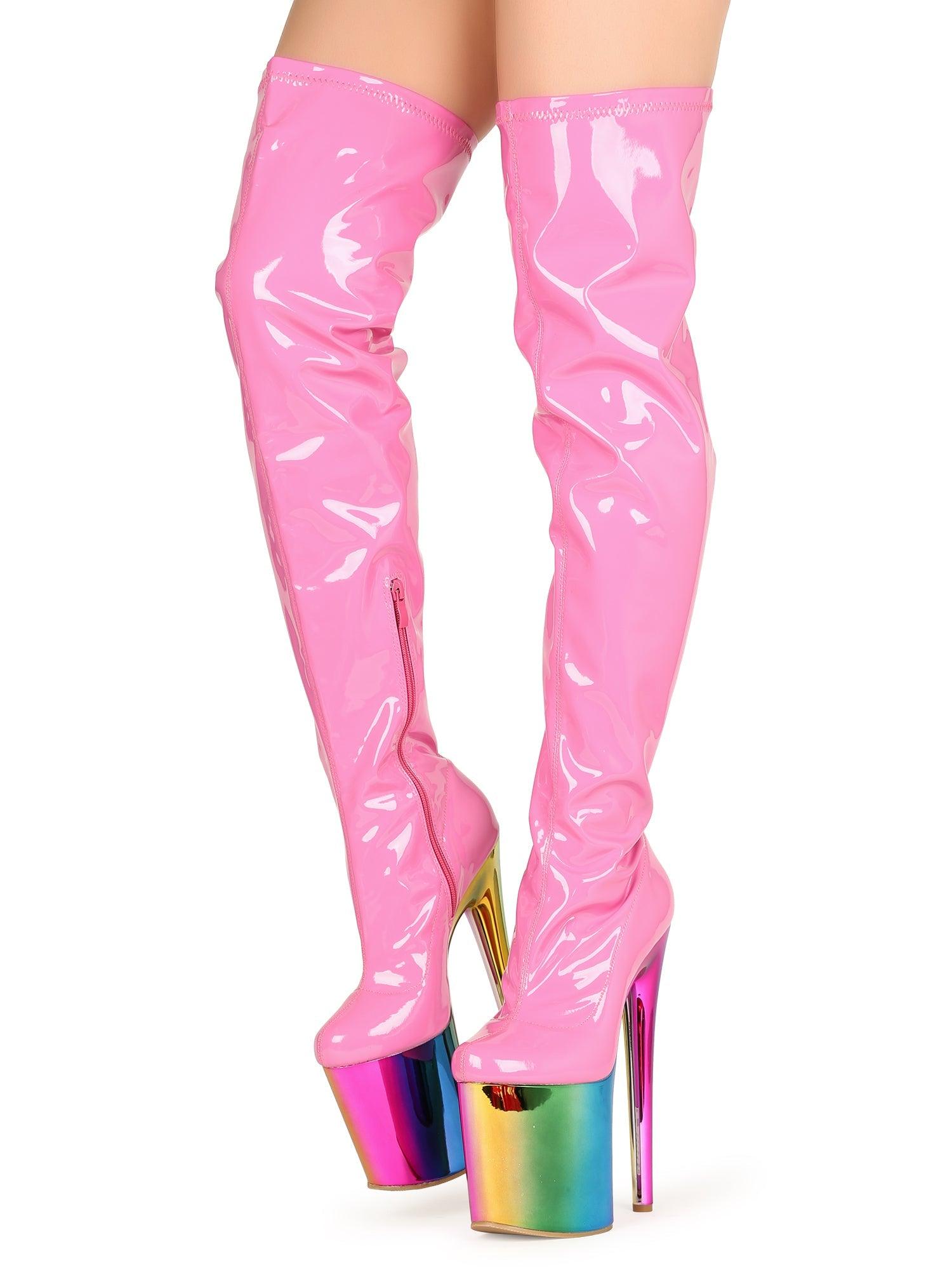 Women's fuchsia thigh high boot with multi-colored platform heels and side zipper closure