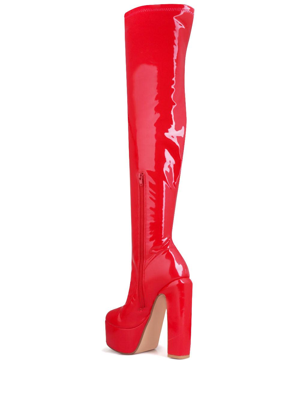 Red colored women long boots-posterior view