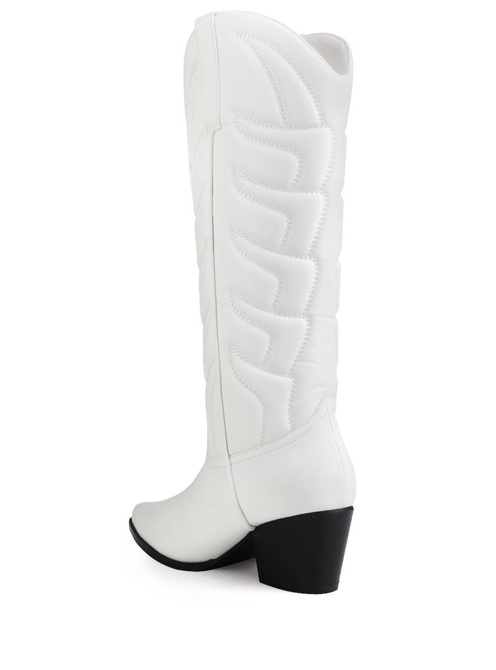 Cowboy style white women boots with black heel-posterior view