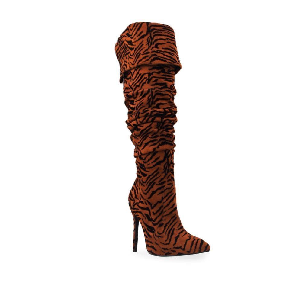 Cognac colored women boots with textured upper and stilleto heel-corner view