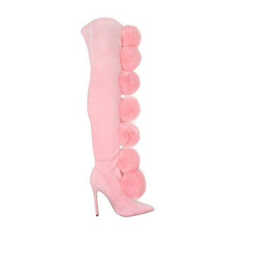 Pink colored women boots with pompoms 