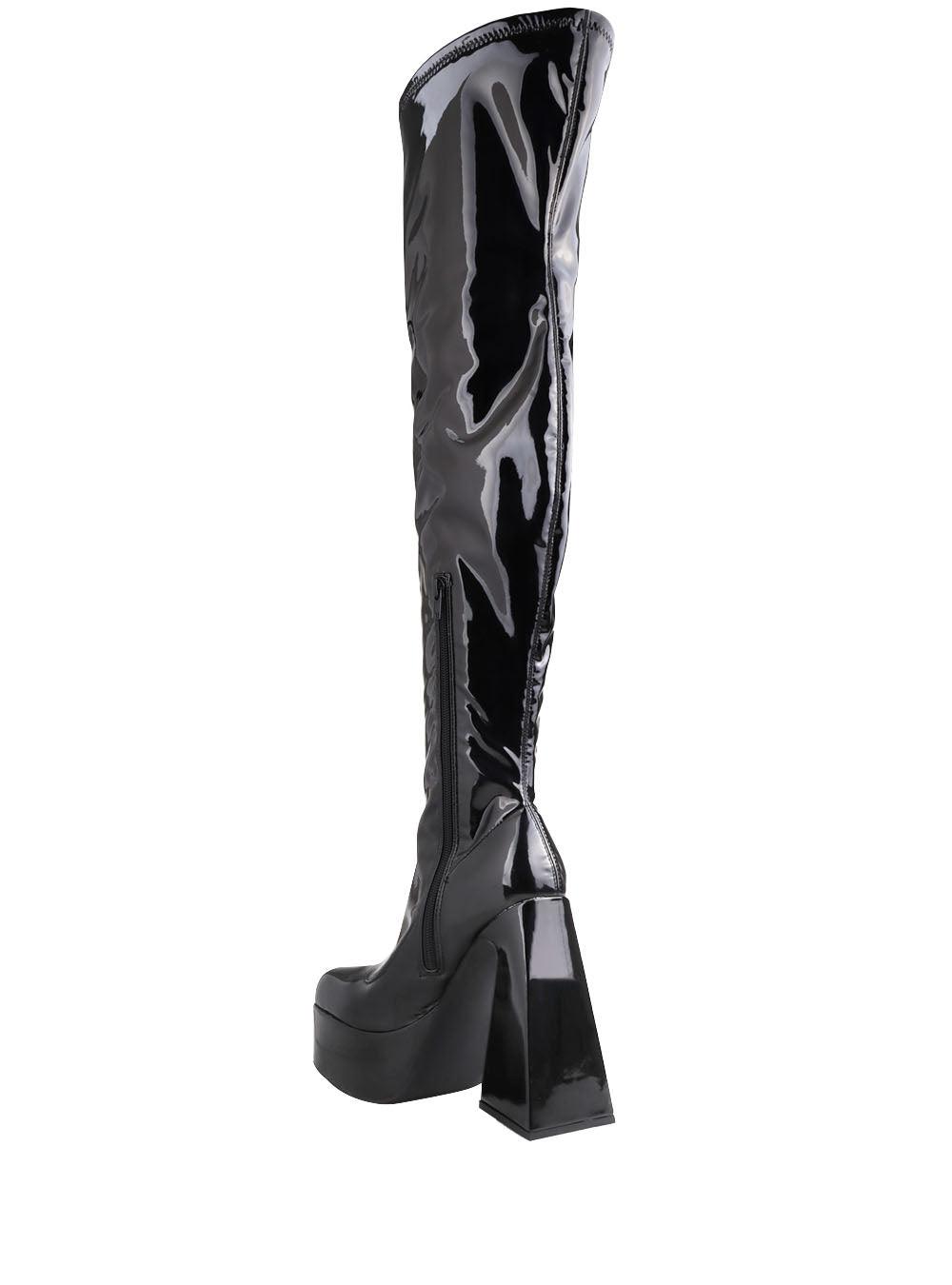 Black colored women boots with block heel and platform-posterior view