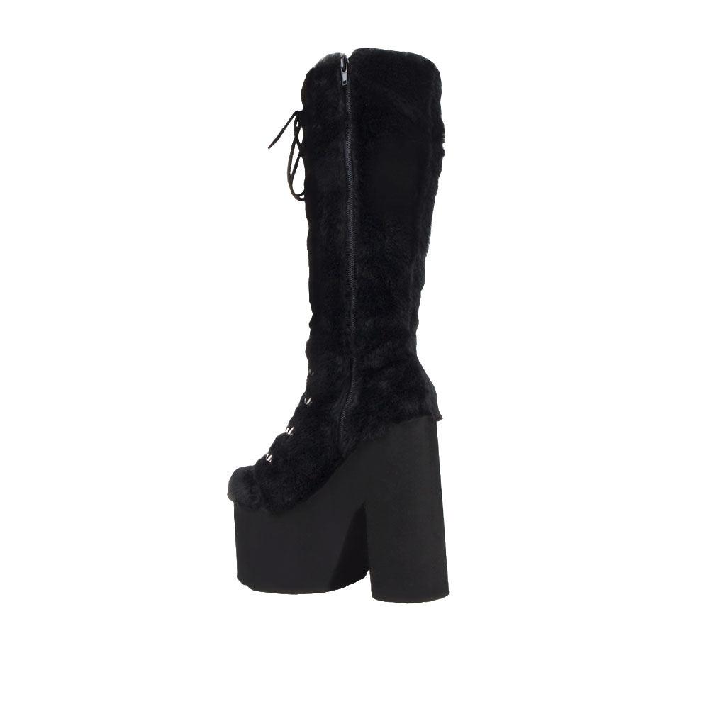 Black fur women boots with laces and black platforms-posterior view