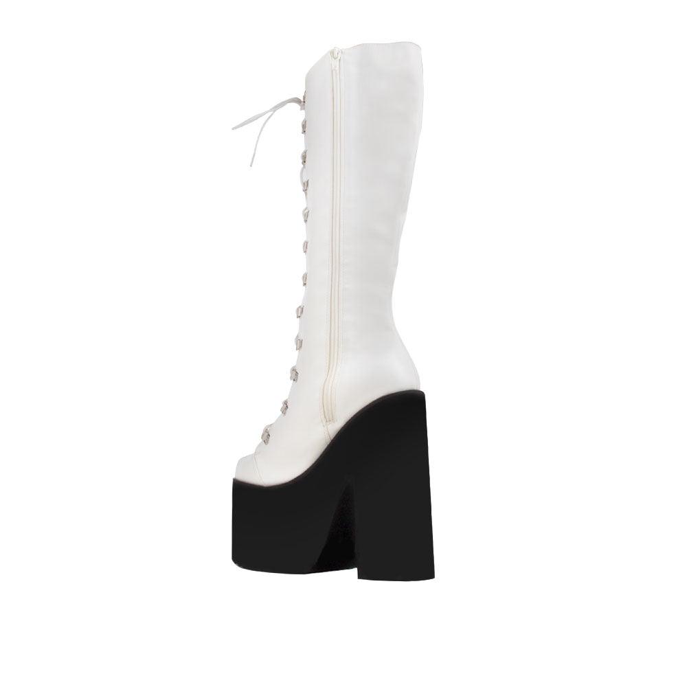 White women boots with laces and black platforms-posterior view