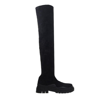Black colored knee high platform boots with slip on design