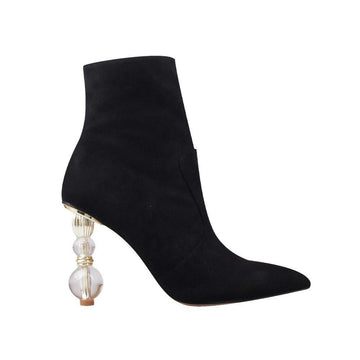 Black colored ankle high boot with beaded heels, pointed toe and side zipper clasp
