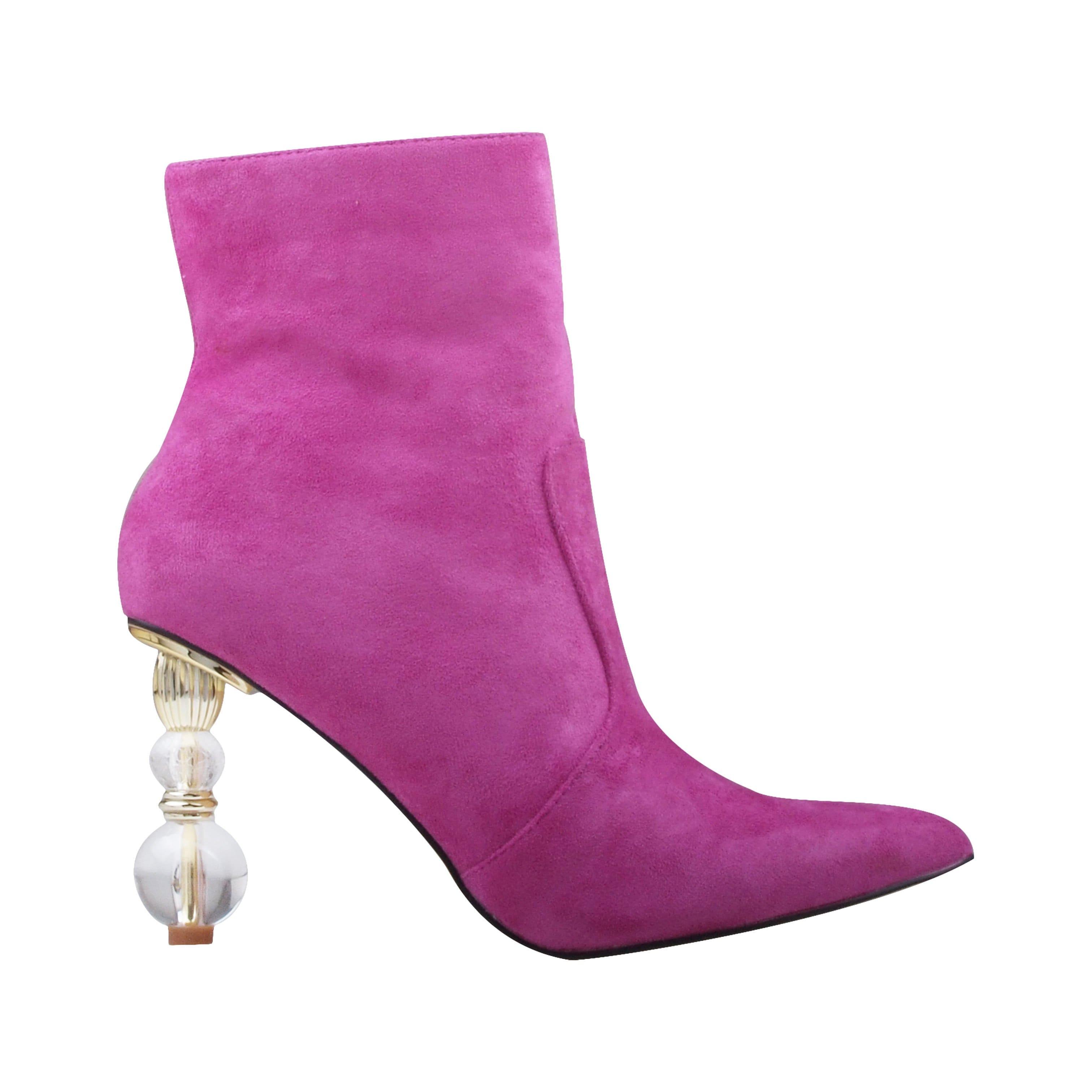 Fuchsia ankle boot with beaded heels, pointed toe, and side zip fastening.