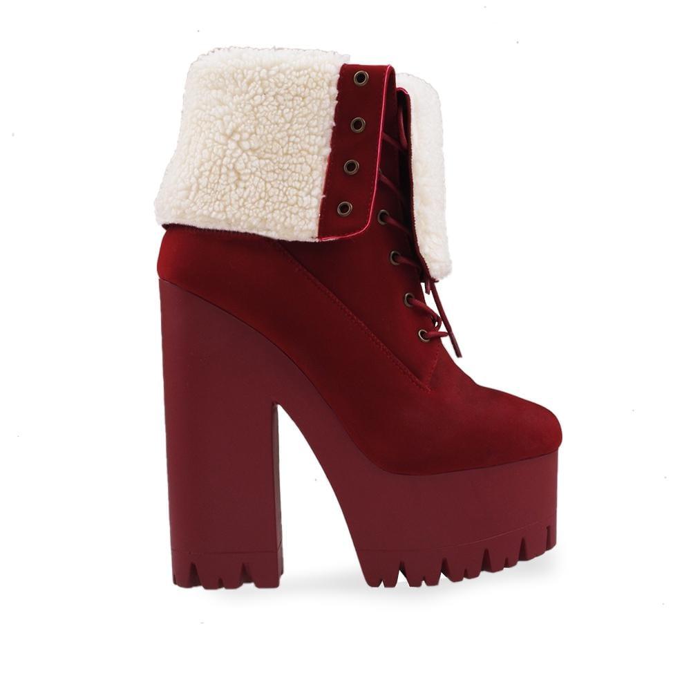 Burgundy colored platform boot heels with shearling cuff and lace up closure