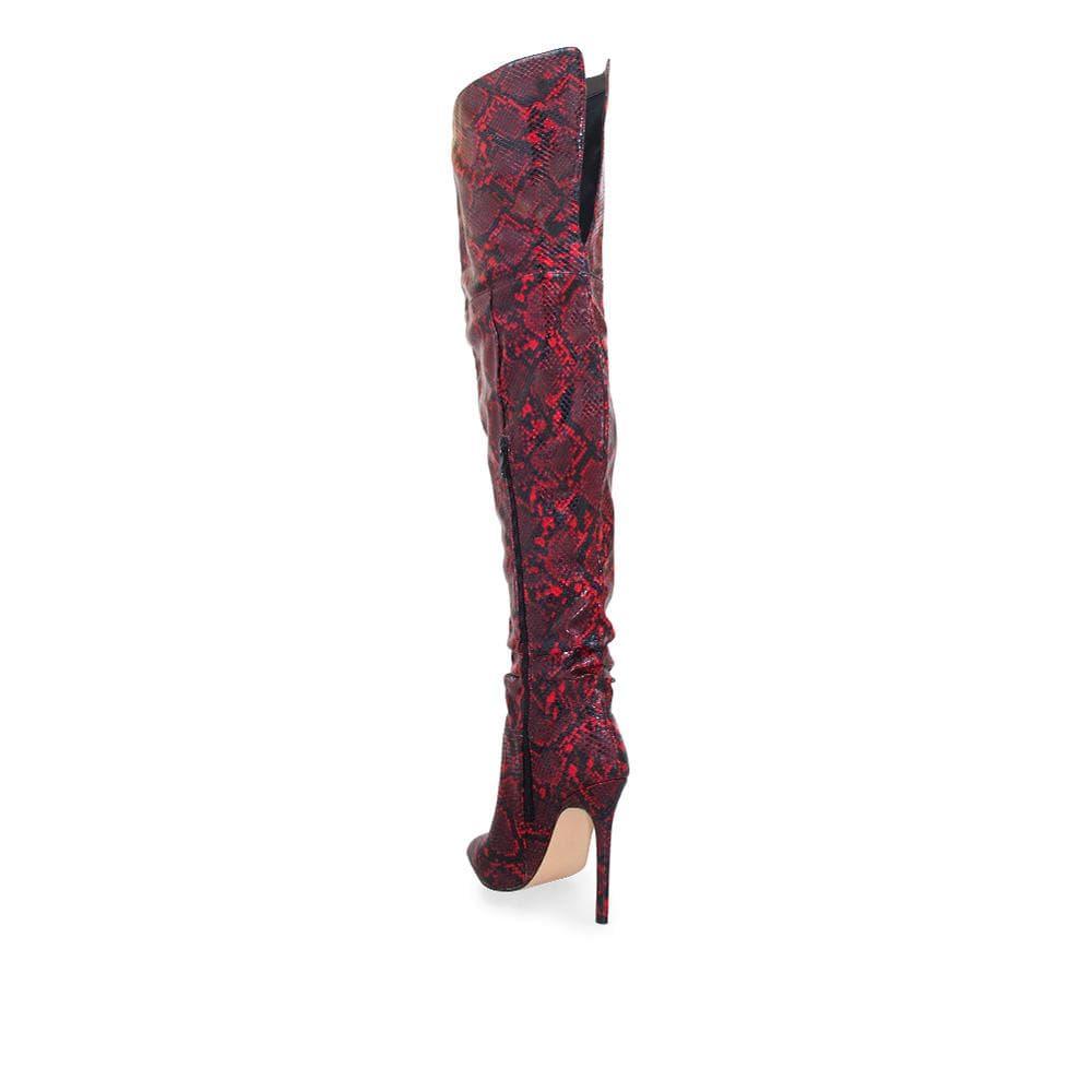 Red thigh high women's booties with faux snake skin-posterior view