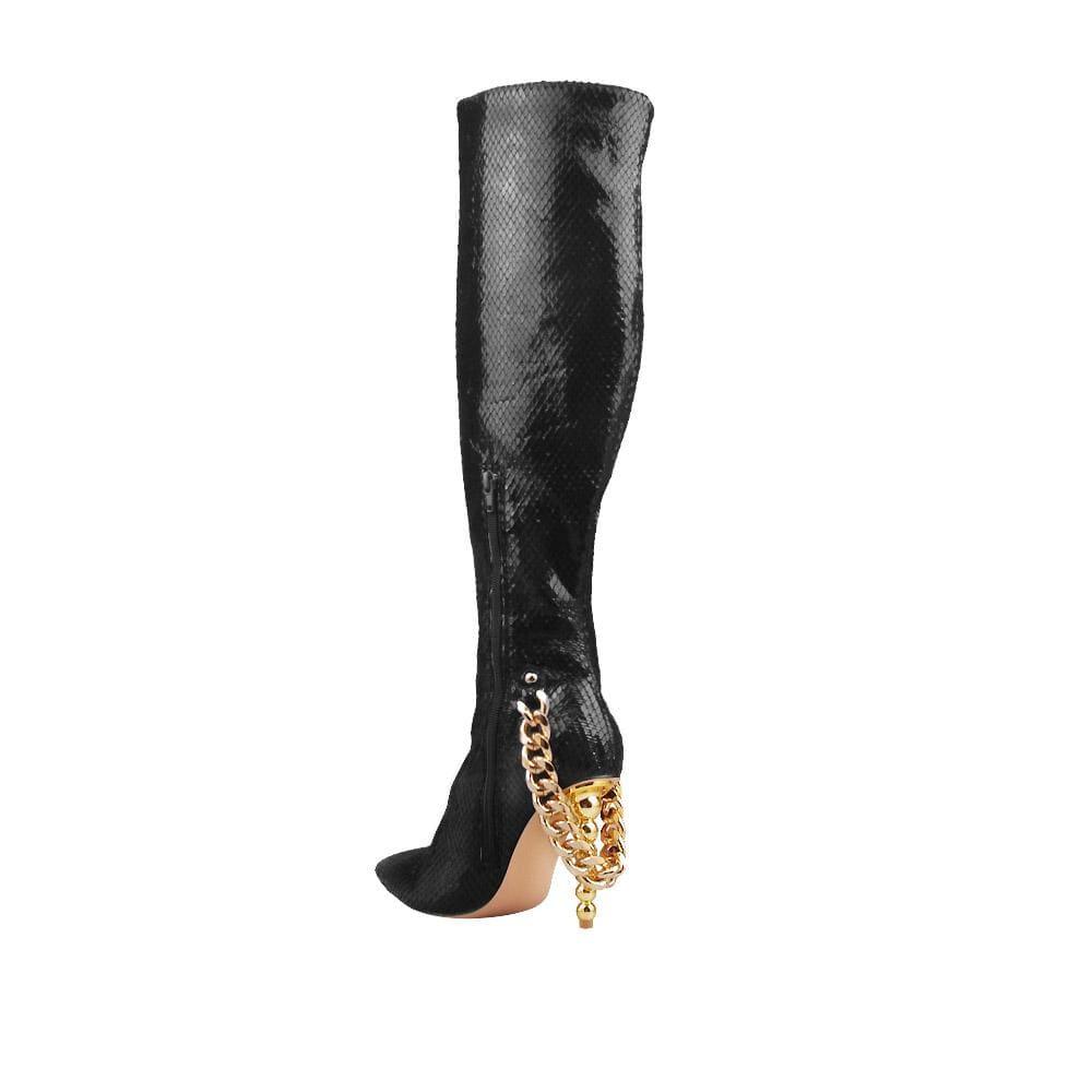 Black knee-high faux snakeskin vegan leather women's boot with gold chain-posterior view