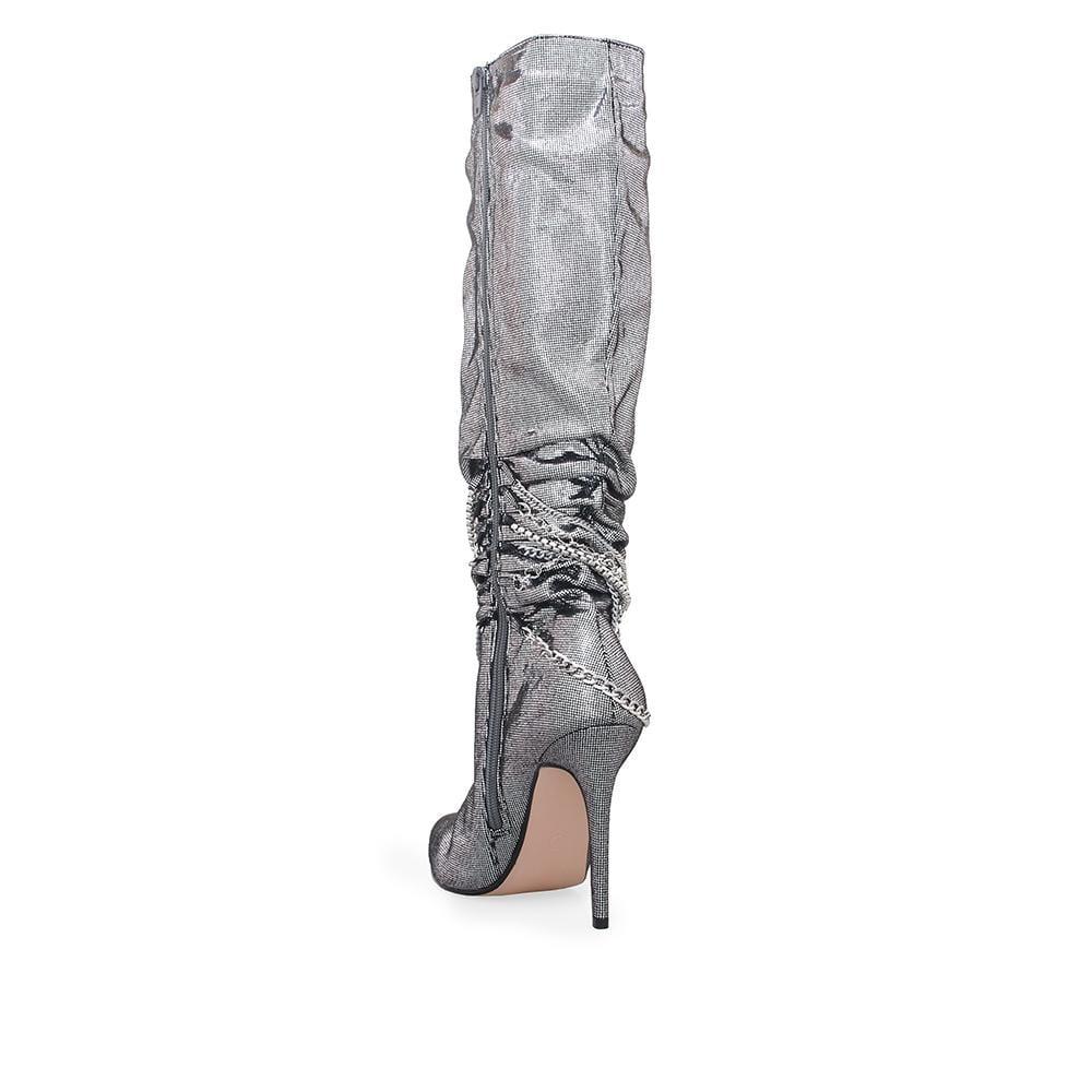 Silver knee high women's boots with metallic silver chains-posterior view