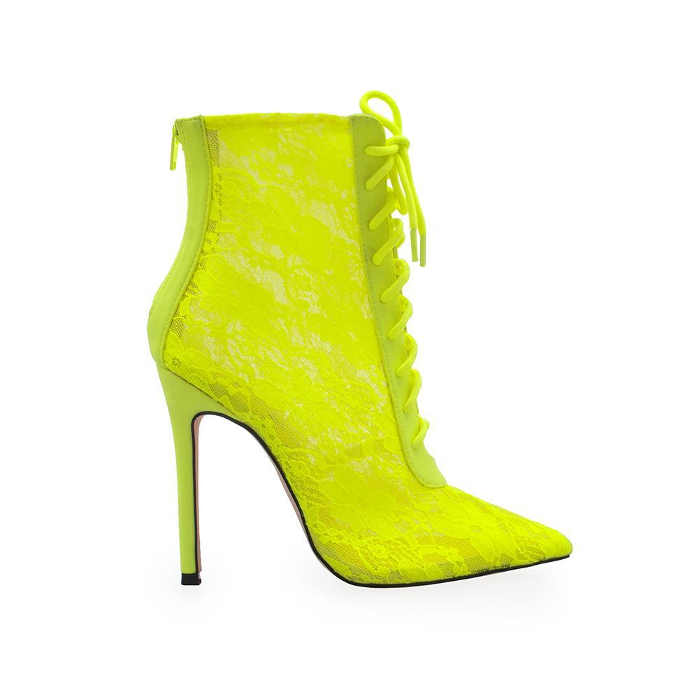 Neon yellow colored women's ankle boot heels with floral lace mesh and back zipper