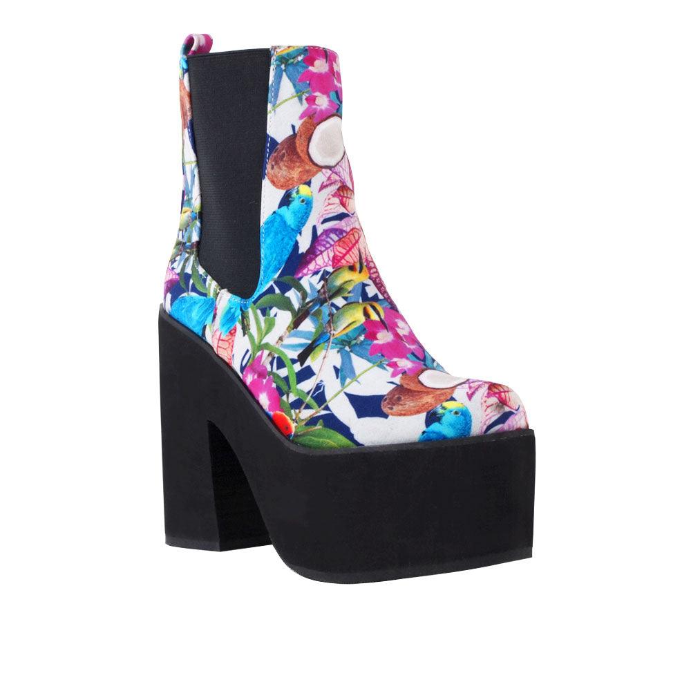 Women's black-colored block heel ankle boots with a floral-multicolored pattern on the upper and slip-on style-corner view