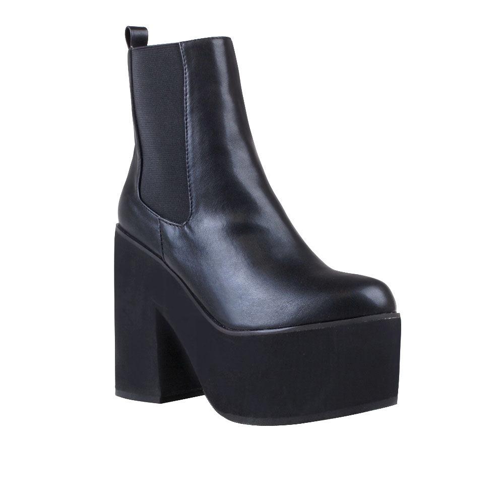 Women's black-colored ankle boot with block heels and slip-on style-corner view