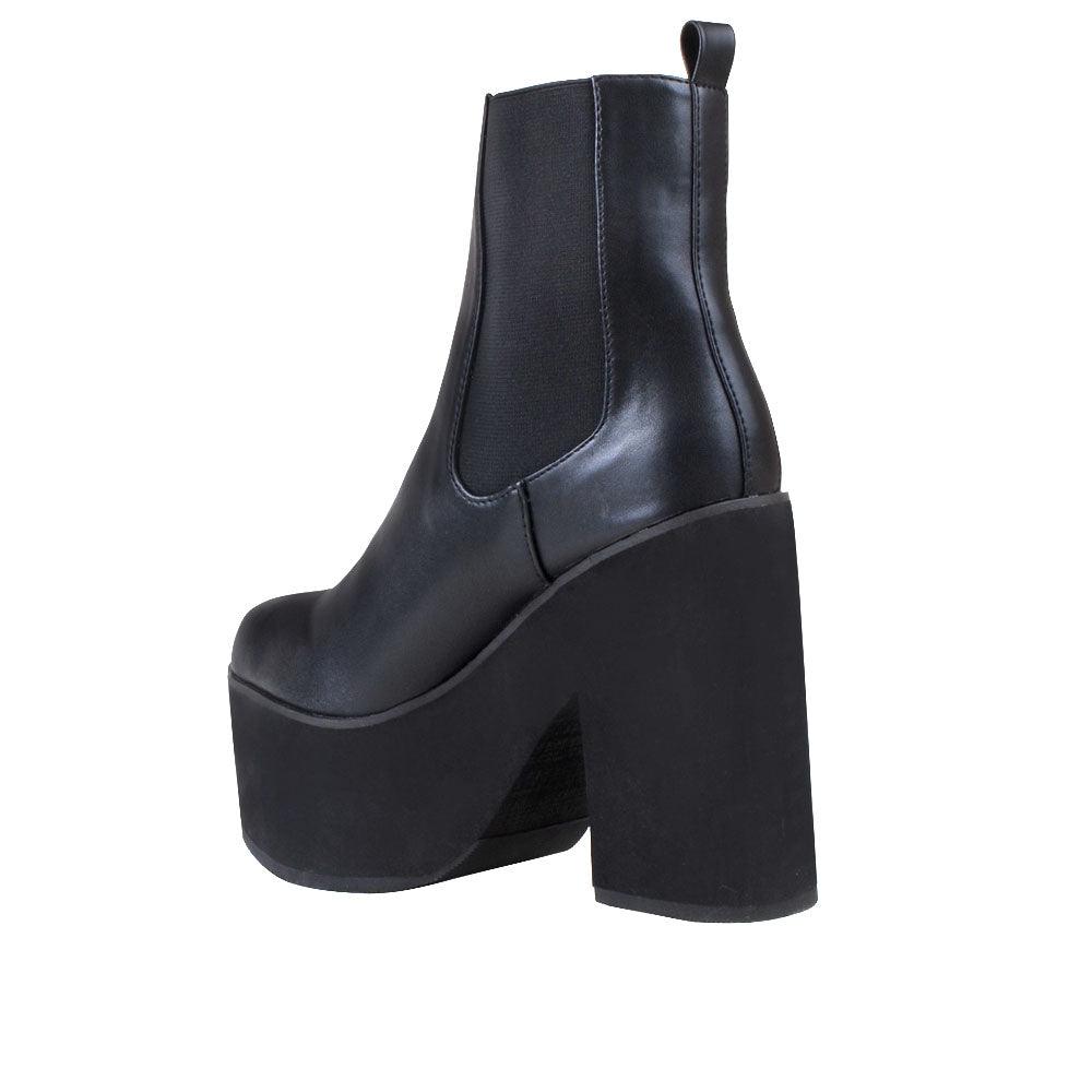 Women's black-colored ankle boot with block heels and slip-on style-posterior view