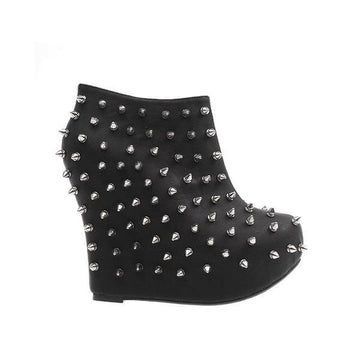 Black-colored women's ankle platform boots with metallic spike studs