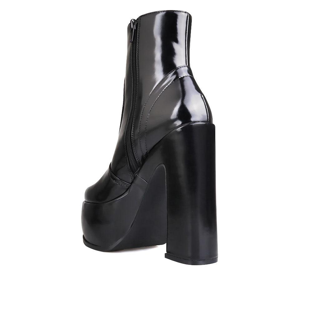 Women's black-colored ankle boots with block heels and side zipper closure-posterior view