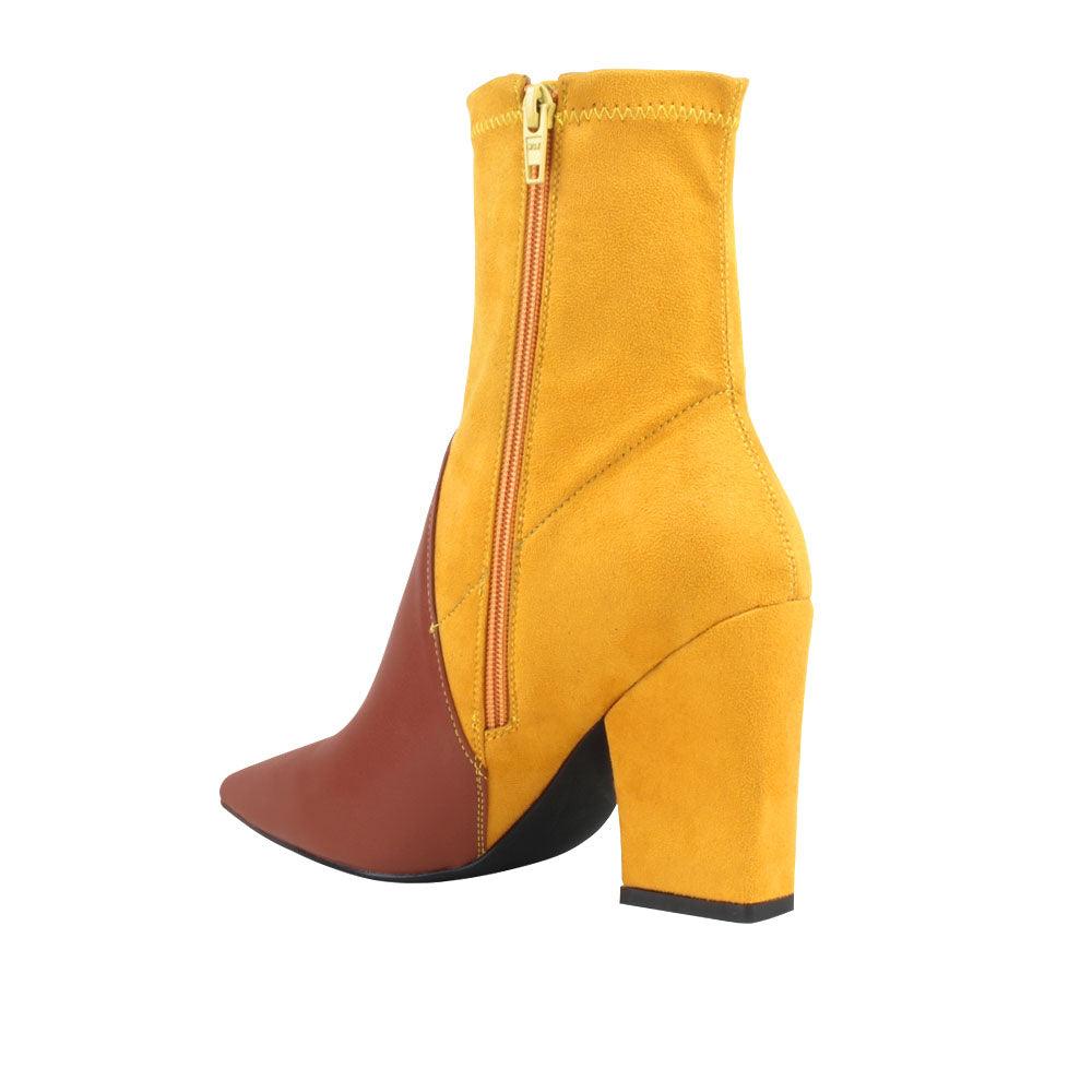 Women's block heel ankle boots in cognac-yellow color with side zipper closure-posterior view