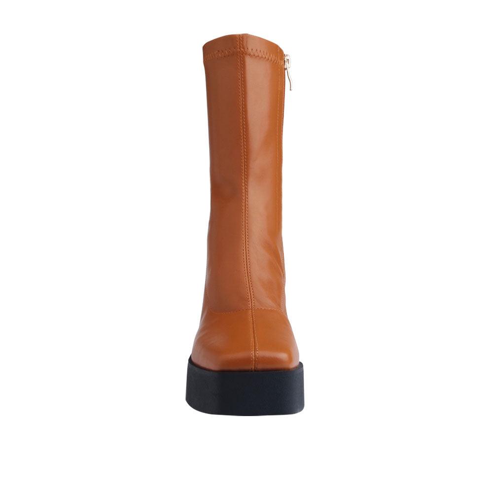 Brown colored women boots with black block heels-front view