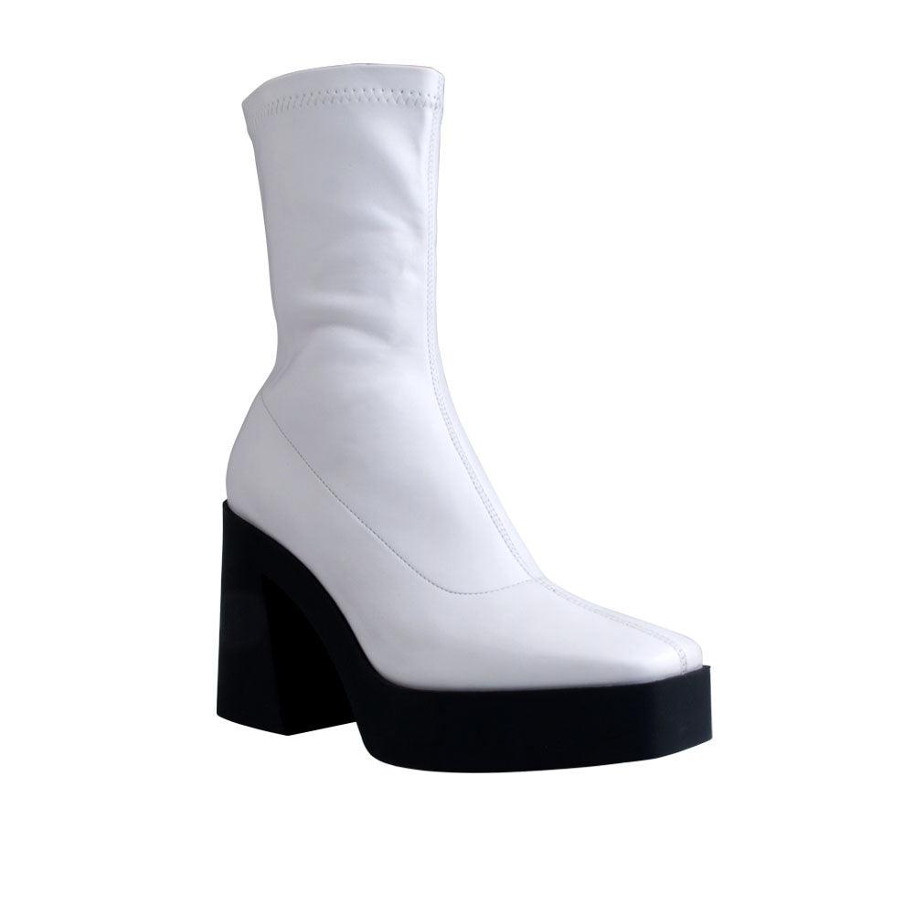 White colored women boots with black block heels-corner view