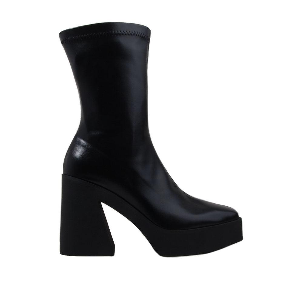 Black colored women boots with black block heels-side view