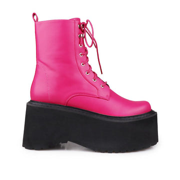 Pink colored women platform boots with black base-side view
