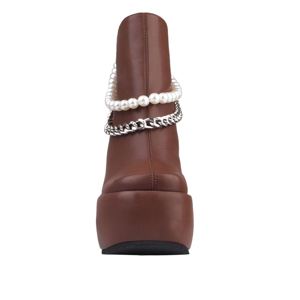 Dark brown colored women bootie platforms with pearl and silver embellished strap-front view