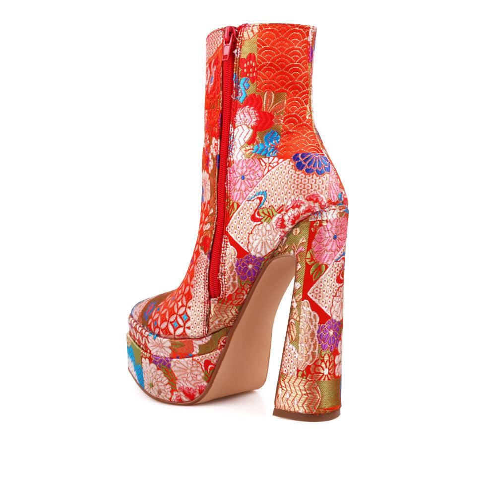 Red shaded floral women booties - posterior view 