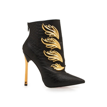 Black colored women booties with golden stilleto heel and golden pattern on upper