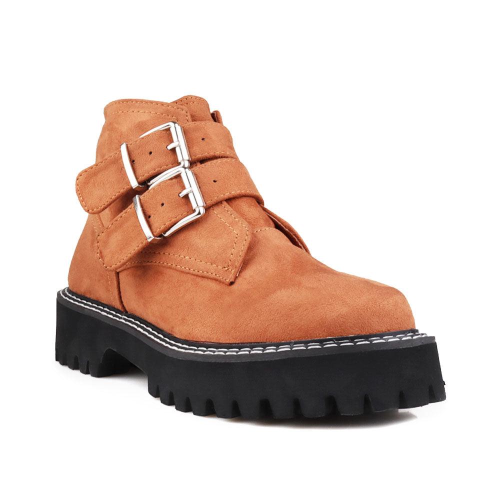 Tan women booties with black platform-corner view