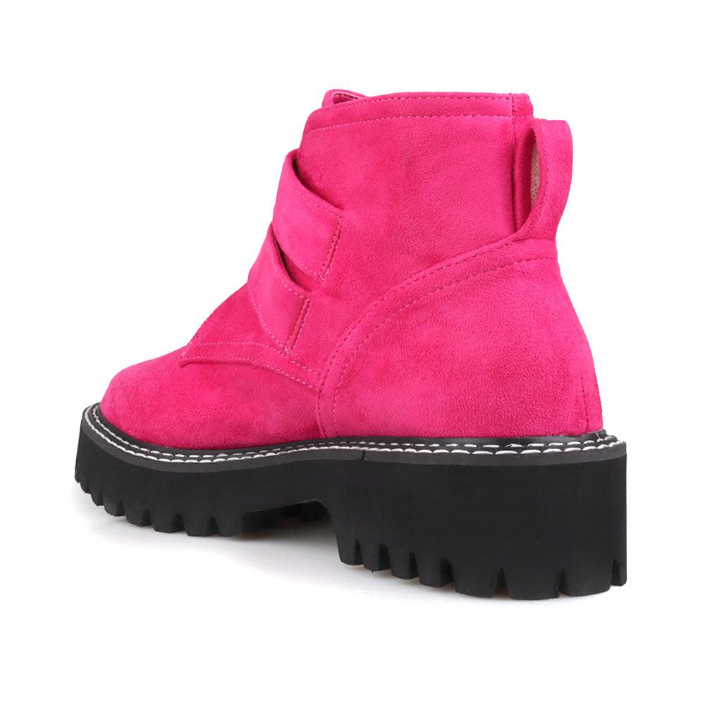 Pink women booties with black platform-posterior view