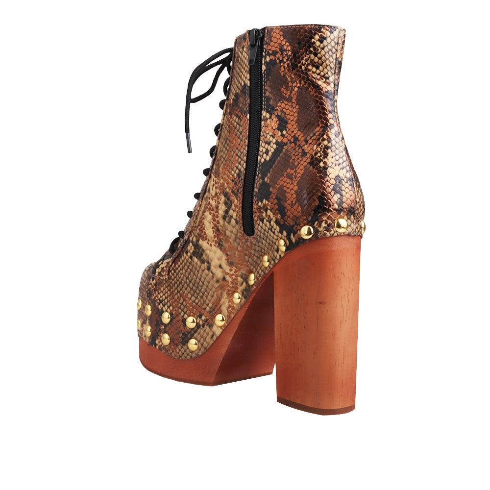 Brown and gold snake textured women boots with brown heel-posterior view