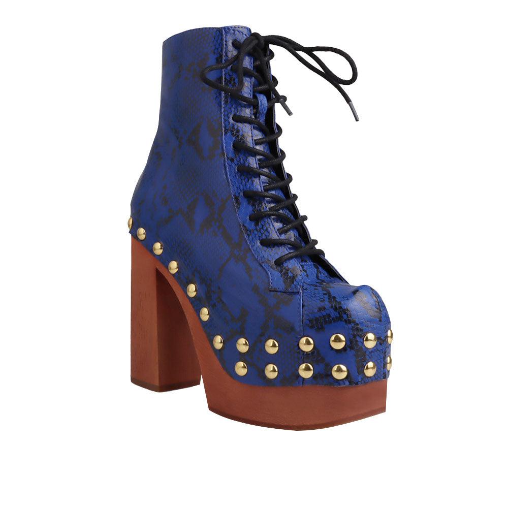 Blue and gold snake textured women boots with brown heel-corner view