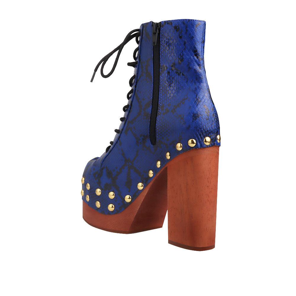 Blue and gold snake textured women boots with brown heel-posterior view