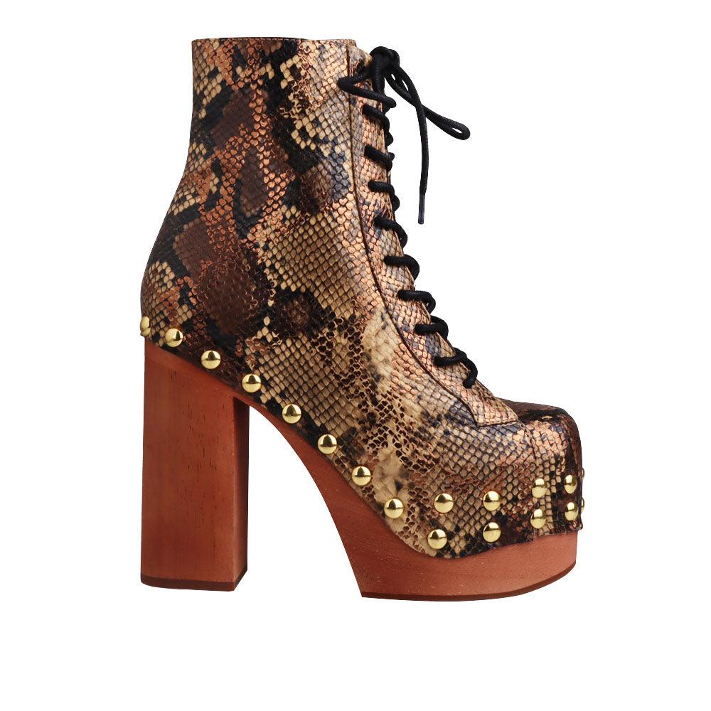 Brown and gold snake textured women boots with brown heel-side view