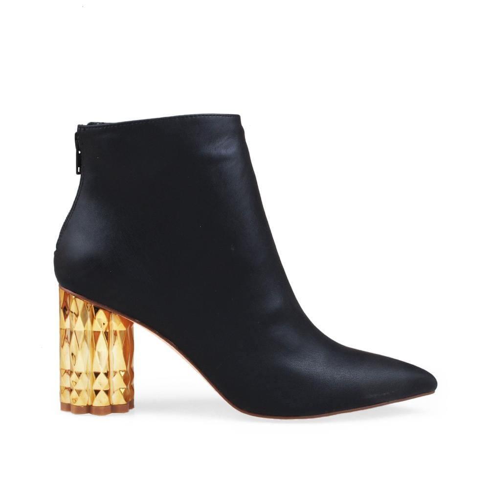 Black colored women booties with golden heel and back zipper closure