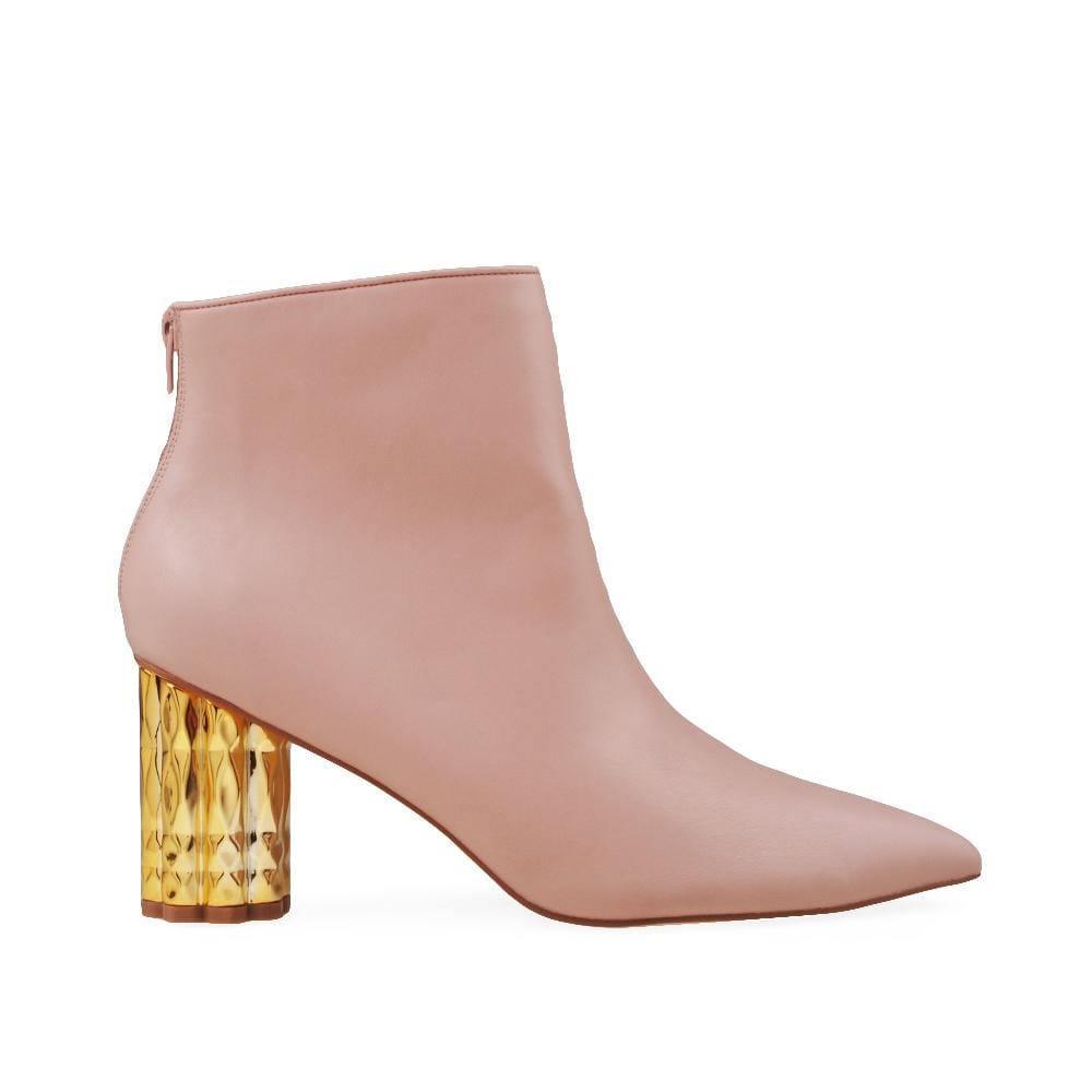 Nude colored women booties with golden heel and back zipper closure