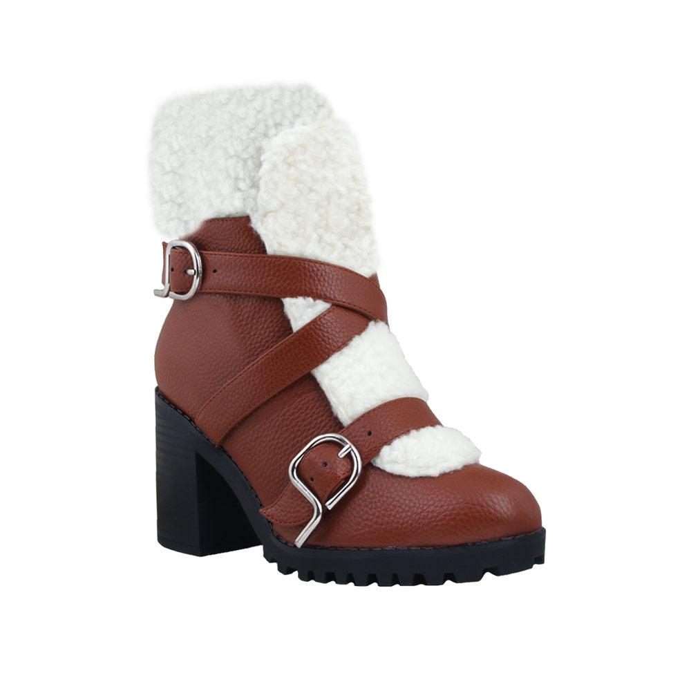 Cognac colored women booties with black platform and fur top-corner view