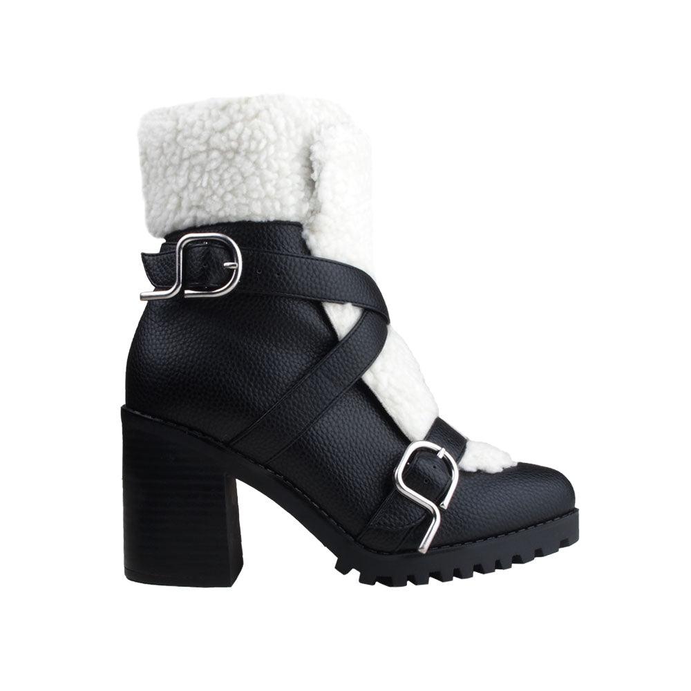 Black colored women booties with black platform and fur top-side view