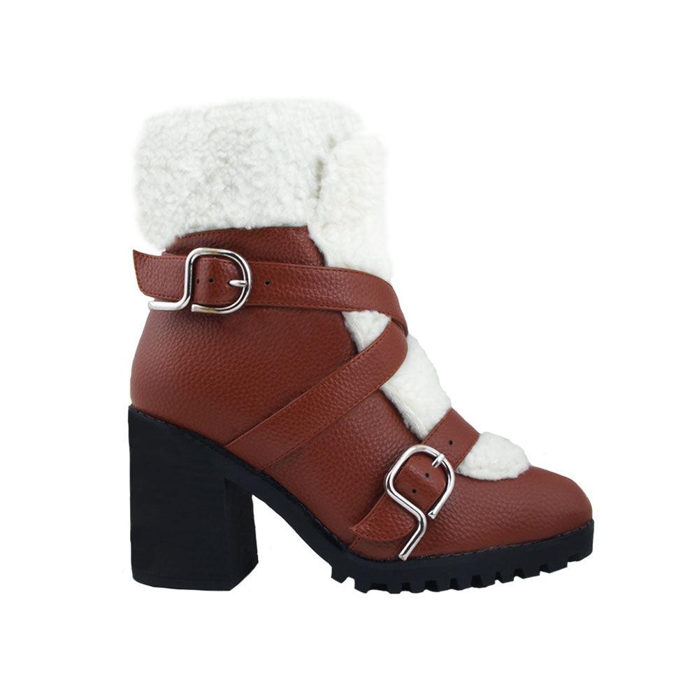 Cognac colored women booties with black platform and fur top-side view