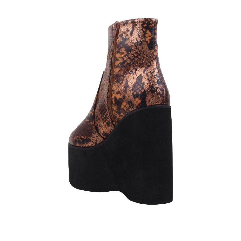 Tan snake textured women booties with black platform-posterior view