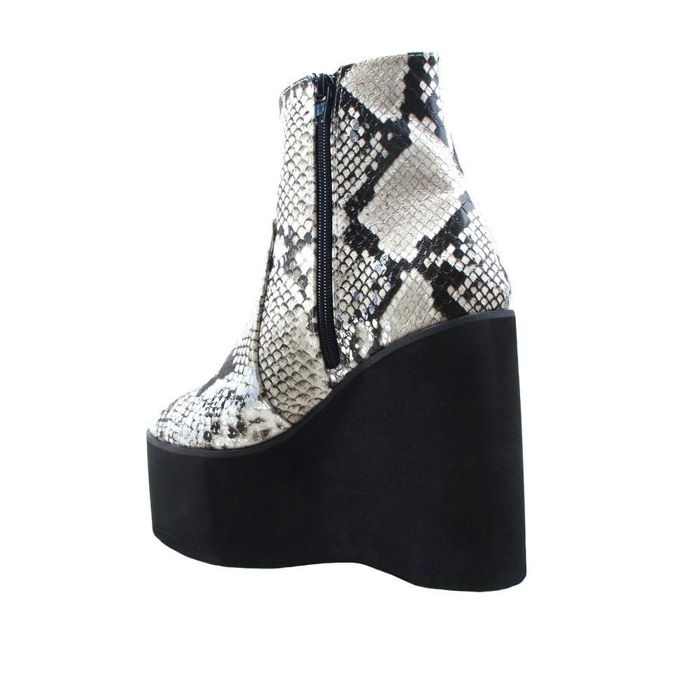 White snake textured women booties with black platform-posterior view