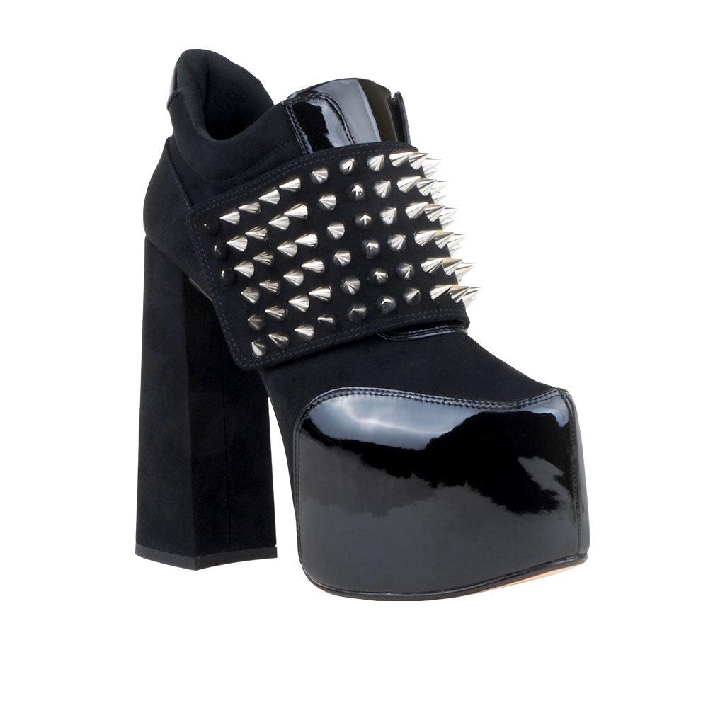 Women ankle bootie platform with studs and chunky heels in black-corner view