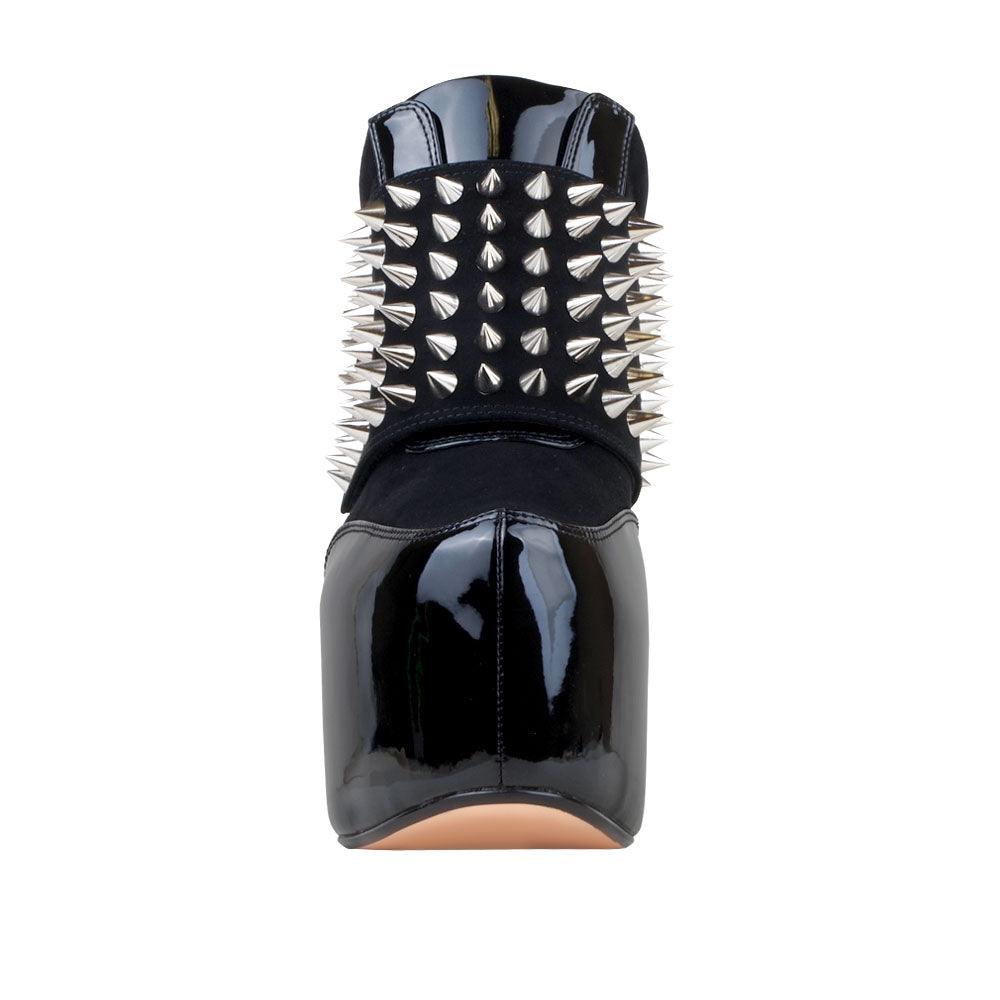 Women ankle bootie platform with studs and chunky heels in black-front view