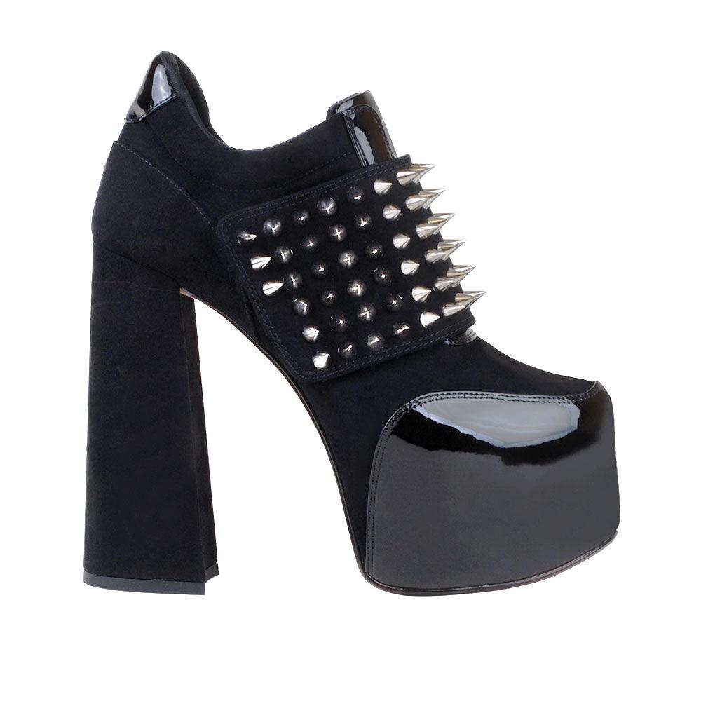 Women ankle bootie platform with studs and chunky heels in black-side view