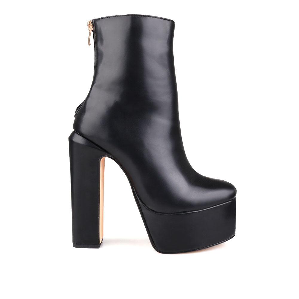 Vegan leather chunky heel women booties in black-side view