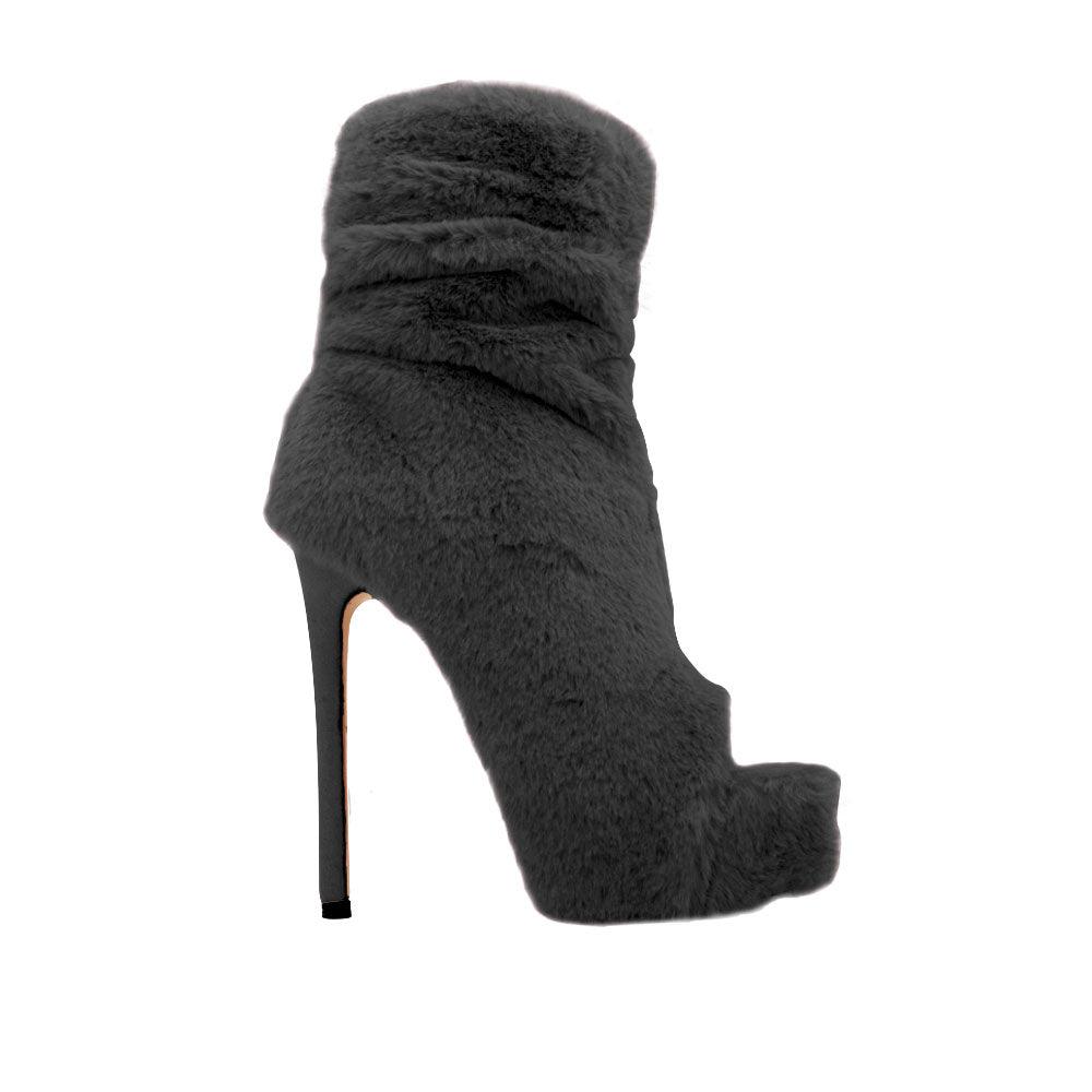 Shearling ankle high boot heels in black with open toe and rear zipper closure